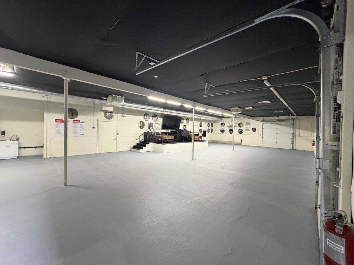 Concrete floor after coating - clean smooth grey finish