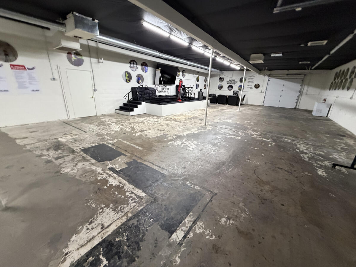 Concrete floor before coating - cracked and peeling